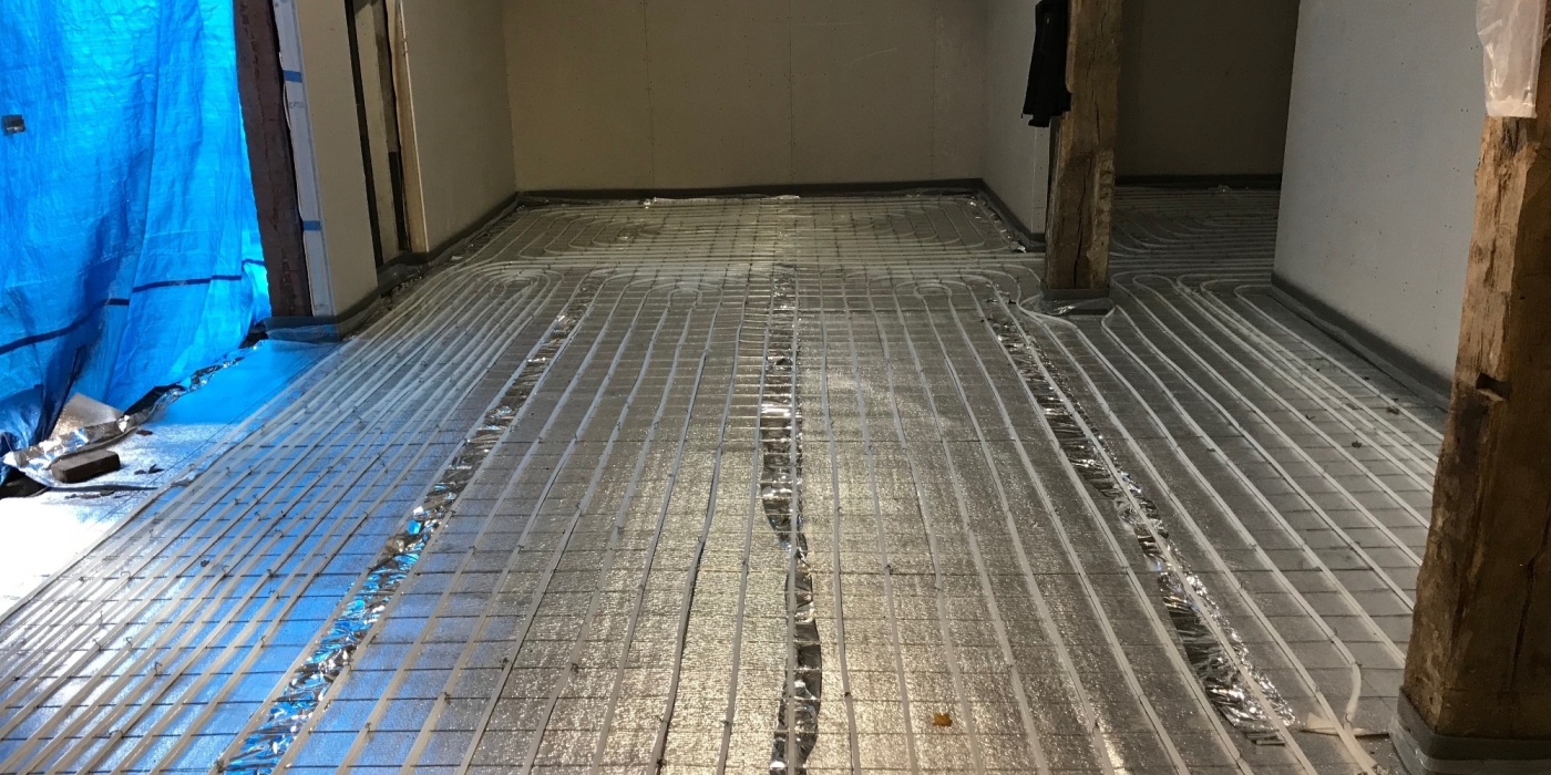 Vloerverwarming voor een atelier in Brucht